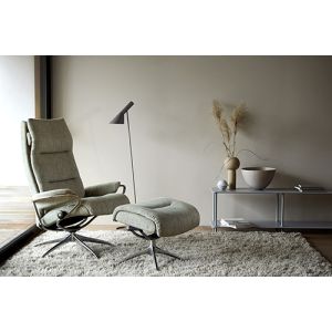 Ekornes Stressless Tokyo High Back Recliner with Ottoman in fabric on a Chrome 5 Star Base Profile View